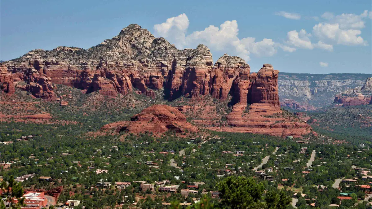Open-air van at a red rock viewpoint on a short Sedona sightseeing tour
