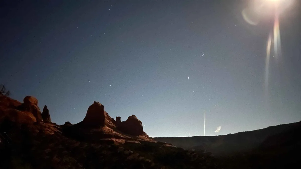 Guide pointing out the Milky Way on a private Sedona stargazing tour